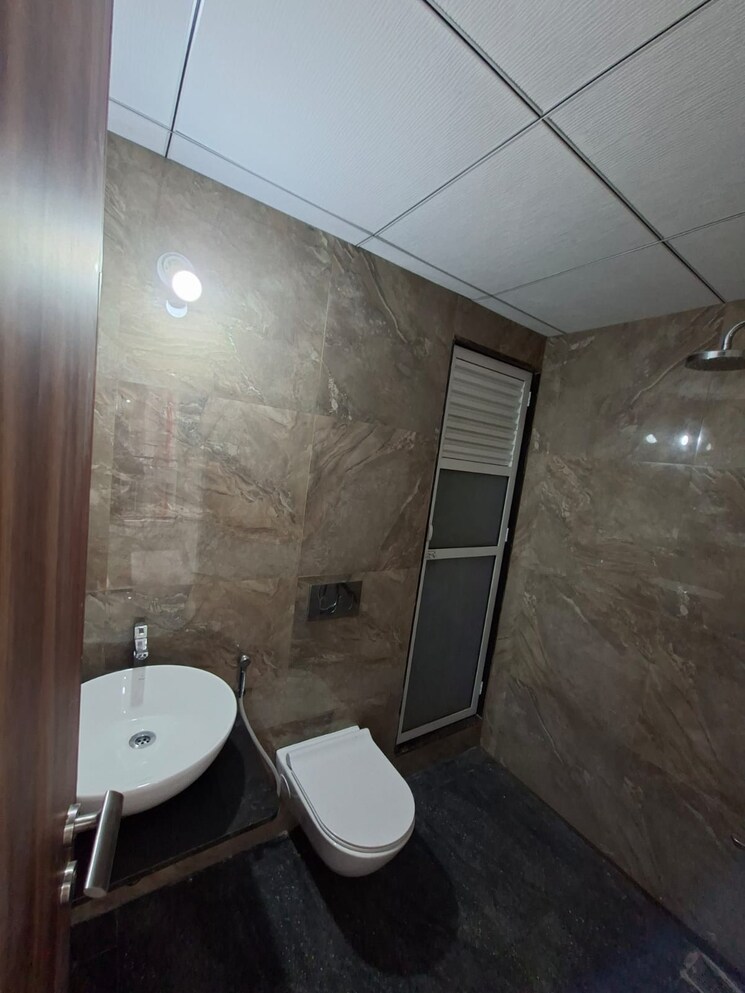 Bathroom, pushpak-larkins-315-fio 1 Bedroom 490 Sq.Ft. Apartment In Panch Pakhadi Thane 8767316