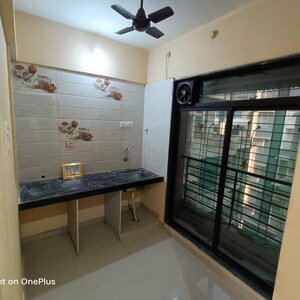 Kitchen in 1 BHK Apartment at Gangotri CHS Kamothe, Kamothe Sector 18 – for Sale