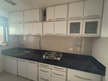 Kitchen in 2.5 BHK Apartment at Raheja Acropolis, Deonar – for Sale
