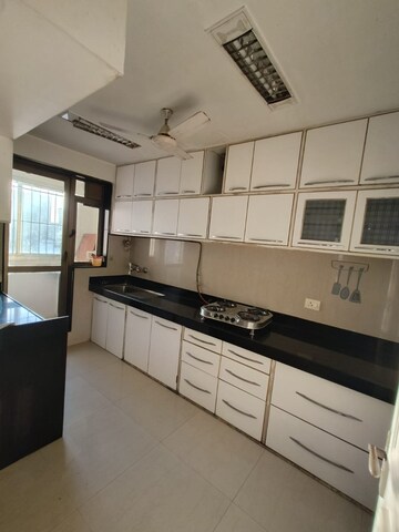 Kitchen in 2.5 BHK Apartment at Raheja Acropolis, Deonar – for Sale