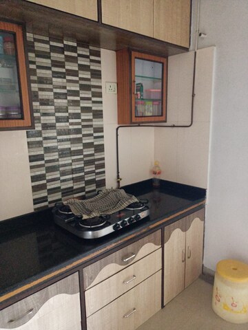 Kitchen in 2 BHK Apartment at Suyog Heights, Kopar Khairane – for Sale