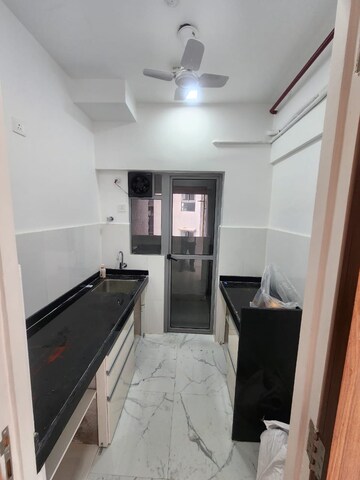 Kitchen in 1 BHK Apartment at Dynamix Avanya, Dahisar East – for Rent