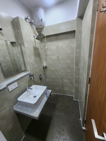 Bathroom in 1 BHK Apartment at Dynamix Avanya, Dahisar East – for Rent