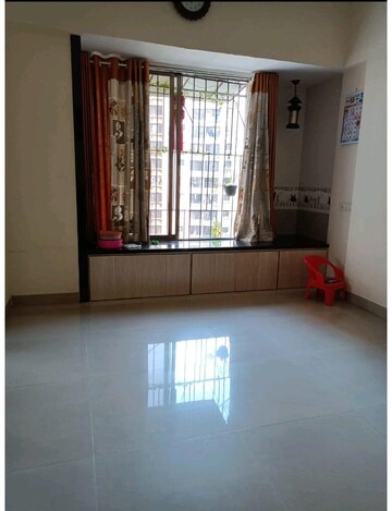Living Room in 1 BHK Apartment at Runwal Garden City, Balkum Pada – for Sale
