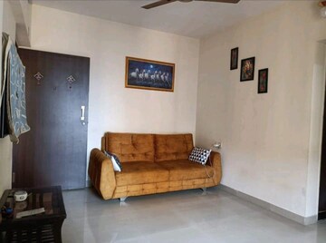 Living Room in 1 BHK Apartment at Runwal Garden City, Balkum Pada – for Sale