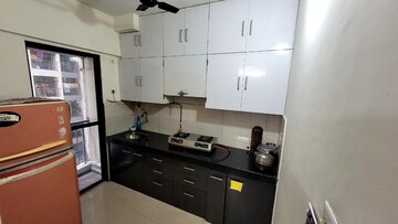 Kitchen in 1 BHK Apartment at Man Opus, Mira Road – for Rent