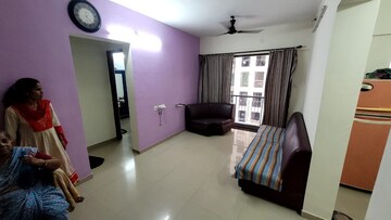 Living Room in 1 BHK Apartment at Man Opus, Mira Road – for Rent