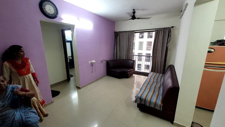 Living Room, man-opus 1 Bedroom 699 Sq.Ft. Apartment In Mira Road Thane 8767837