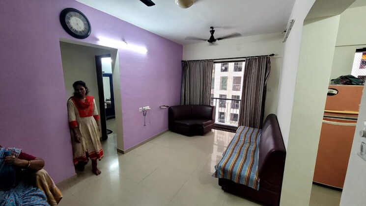 Living Room, man-opus 1 Bedroom 699 Sq.Ft. Apartment In Mira Road Thane 8767837