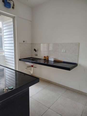 Kitchen in 2 BHK Apartment at Mahindra Centralis Tower 1, Pimpri – for Rent