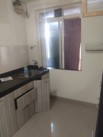 Kitchen in 2 BHK Apartment at Rustomjee Athena, Majiwada – for Rent