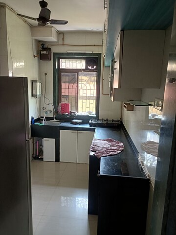 Kitchen in 2 BHK Apartment at Sai Karuna CHS, Vashi Sector 28 – for Rent