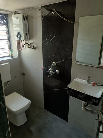 Master Bedroom in 2 BHK Apartment at Sai Karuna CHS, Vashi Sector 28 – for Rent