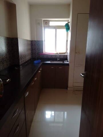 Kitchen in 2 BHK Apartment at Lodha Amara, Kolshet Road – for Rent