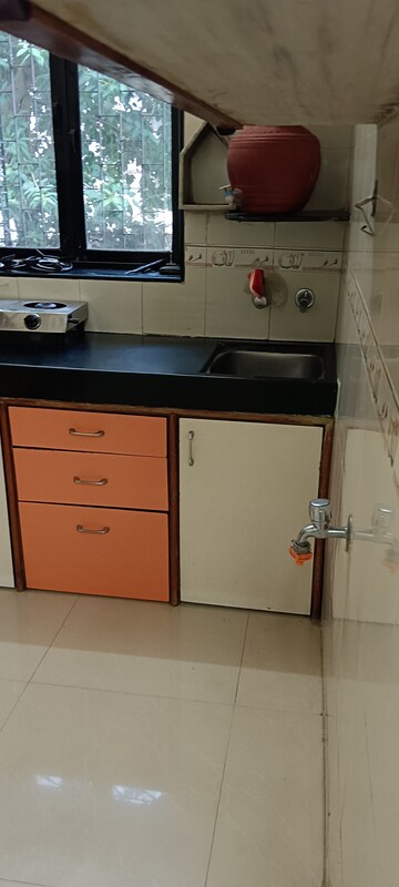 Kitchen in 1 BHK Apartment at Malad CHS, Malad East – for Rent