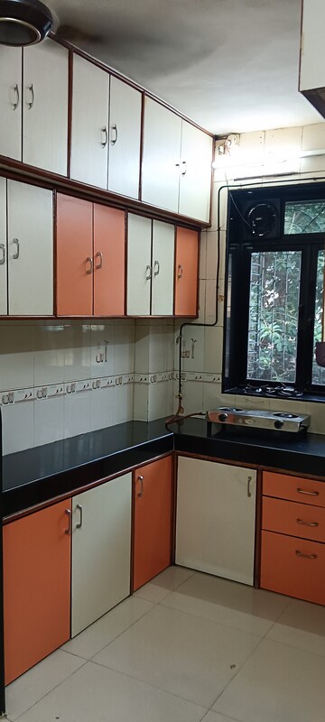 Kitchen in 1 BHK Apartment at Malad CHS, Malad East – for Rent