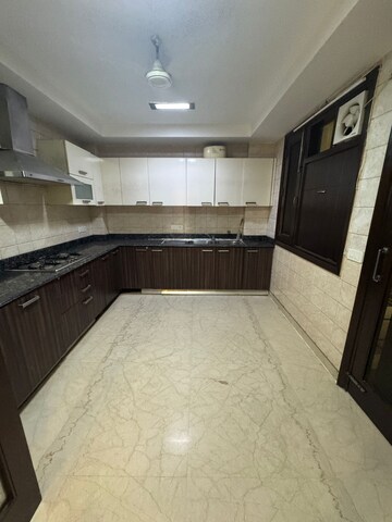 Kitchen in 4 BHK Builder Floor at New Friends Colony – for Rent