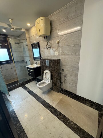 Bathroom in 4 BHK Builder Floor at New Friends Colony – for Rent