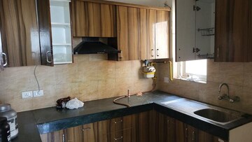 Kitchen in 3 BHK Builder Floor at Silver Oak Society, Judge Society – for Rent