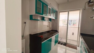 Kitchen in 2 BHK Apartment at Rohan CHS, Kothrud – for Rent
