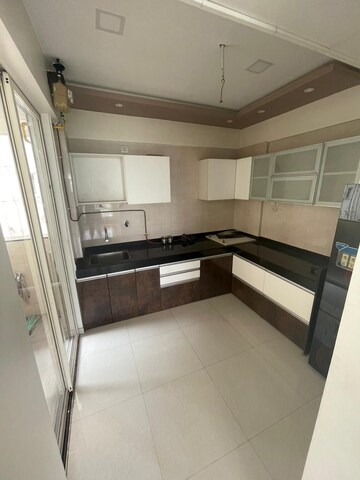 Kitchen in 1 BHK Apartment at Ishwar Parmar River Residency, Chikhali – for Rent