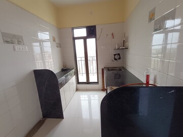 Kitchen in 1 BHK Apartment at Prithvi Srishti Complex, Tembhode – for Sale