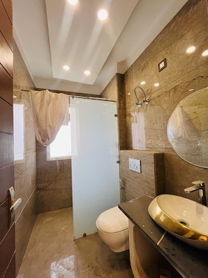 Bathroom in 4 BHK Apartment at Godrej Blue, B L Saha Road – for Sale