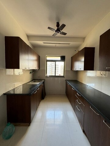 Kitchen in 3 BHK Apartment at Lodha Splendora, Ghodbunder Road – for Rent