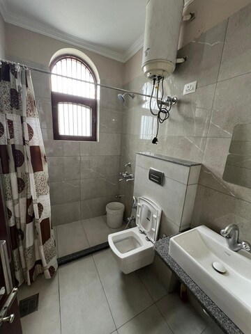 Bathroom in 2 BHK Builder Floor at Sector 10a – for Rent