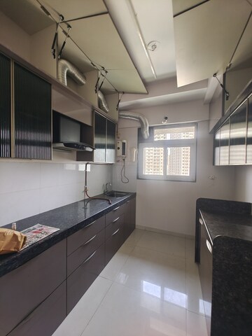 Kitchen in 2 BHK Apartment at Ashar Axis, Majiwada – for Rent