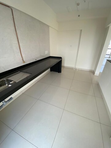 Kitchen in 3 BHK Apartment at Rambaug Colony – for Sale