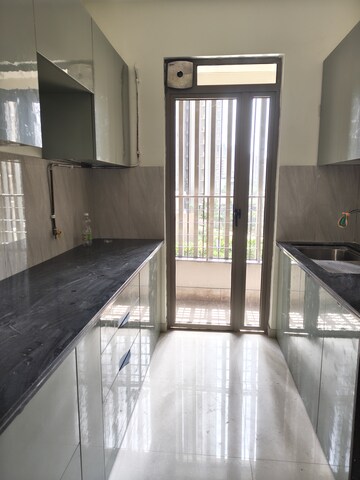 Kitchen in 2 BHK Apartment at Kalpataru Paramount, Kapur Bawdi – for Rent