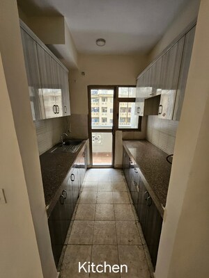 Kitchen in 3 BHK Apartment at Panchsheel Greens, Sector 16 Greater Noida – for Sale