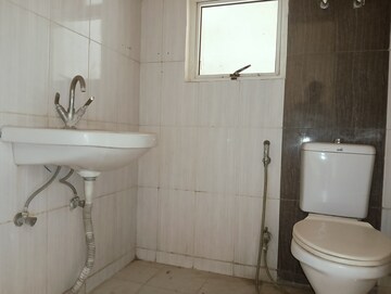 Bathroom in 3 BHK Apartment at Landcraft Golflinks Plaza, Pandav Nagar – for Rent