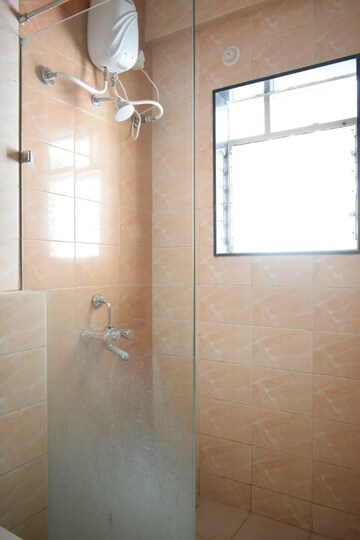 Bathroom in 3 BHK Apartment at Rambaug Colony – for Sale
