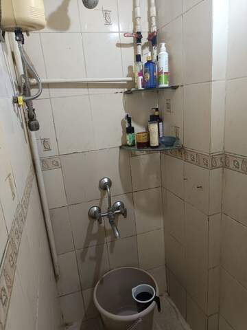 Bathroom in 1 BHK Apartment at Audumber CHS, Goregaon West – for Rent