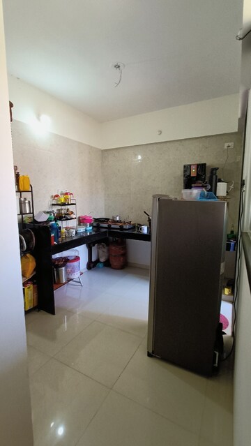 Kitchen in 2 BHK Apartment at Vardhaman Palm Rose, Punawale – for Rent