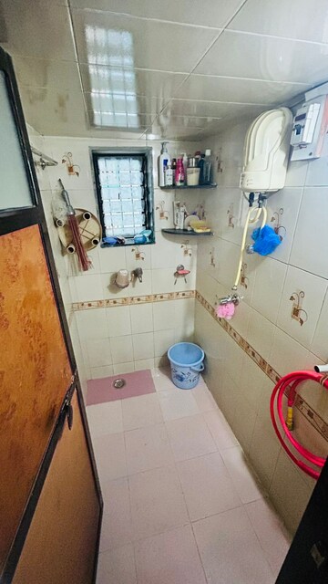 Master Bedroom in 1 BHK Apartment at Parijat CHS, Dombivli East – for Rent
