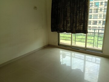 Bedroom in 2 BHK Apartment at Kalp Nisarg Phase II, Shirgaon – for Rent