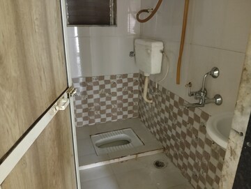 Bathroom in 2 BHK Apartment at Kalp Nisarg Phase II, Shirgaon – for Rent