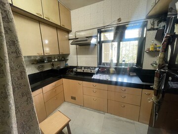 Kitchen in 2 BHK Apartment at Vikash Complex CHS, Uthalsar – for Sale