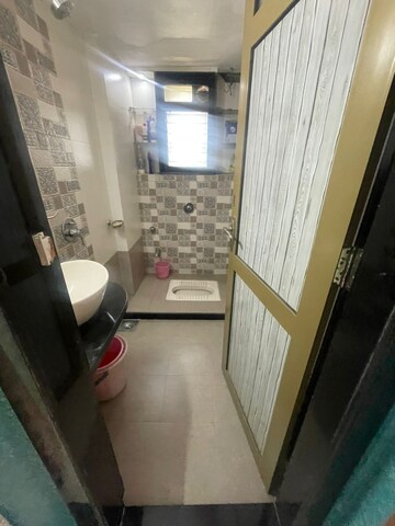 Kitchen in 2 BHK Apartment at Vikash Complex CHS, Uthalsar – for Sale
