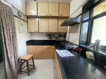 Kitchen in 2 BHK Apartment at Vikash Complex CHS, Uthalsar – for Sale