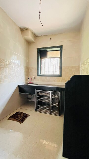 Living Room in 1 BHK Apartment at Shri New Laxmi Villa CHS, Dombivli West – for Sale