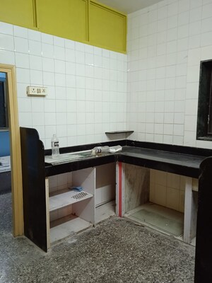 Kitchen in 1 BHK Apartment at Shri New Laxmi Villa CHS, Dombivli West – for Sale