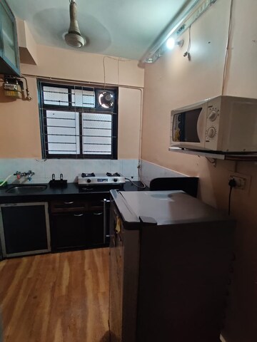 Kitchen in 1 BHK Apartment at Hiranandani Gardens Kingston, Powai – for Rent