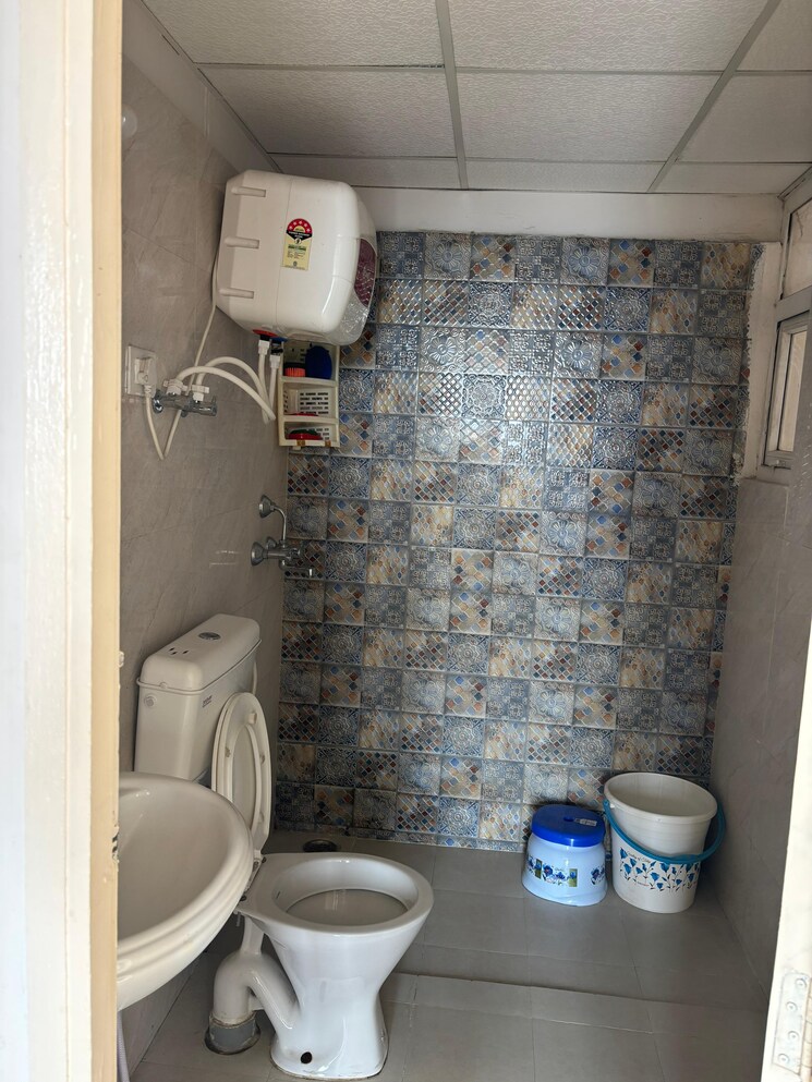 Bathroom, signature-global-the-millennia 2 Bedroom 585 Sq.Ft. Apartment In Sector 37d Gurgaon 8769041