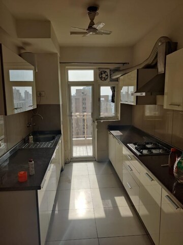 Kitchen in 3 BHK Apartment at DLF Regal Gardens, Sector 90 – for Rent