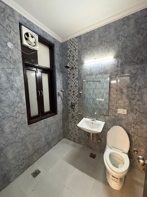 Bathroom in 3 BHK Apartment at Ambience Island Lagoon, Sector 24 – for Sale