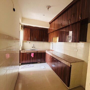 Kitchen in 2 BHK Apartment at Logix Blossom Greens, Sector 143 – for Sale